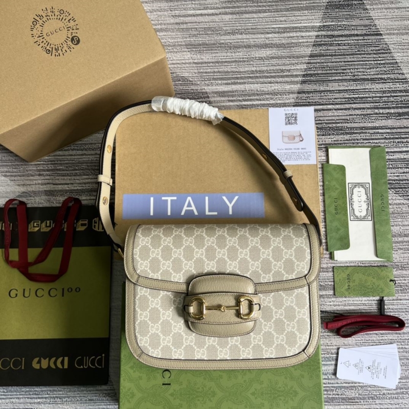 G*u*i top handle bags